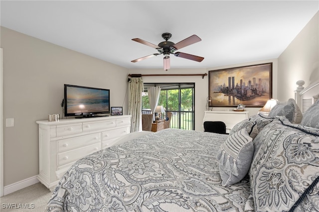 15444 Admiralty Cir Unit 10, North Fort Myers, FL 33917 - carpeted bedroom featuring access to outside, baseboards, and ceiling fan
