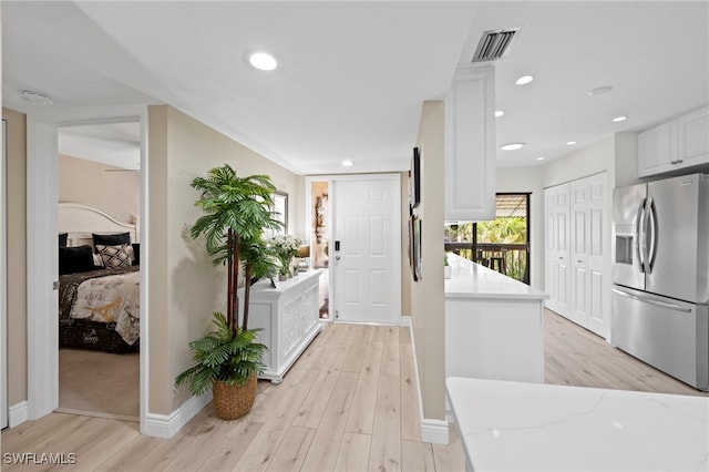 15444 Admiralty Cir Unit 10, North Fort Myers, FL 33917 - entryway featuring baseboards, light wood-style flooring, and recessed lighting