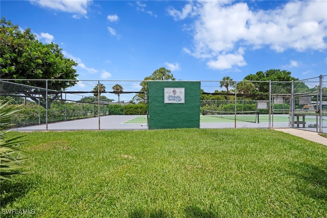 15444 Admiralty Cir Unit 10, North Fort Myers, FL 33917 - view of home's community featuring a gate and a tennis court