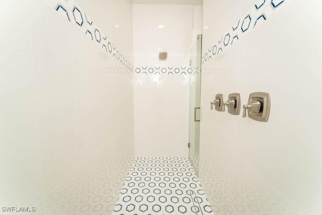 717 Calvin Ave, Lehigh Acres, FL 33972 - bathroom featuring a shower stall