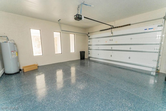 717 Calvin Ave, Lehigh Acres, FL 33972 - garage with water heater and a garage door opener
