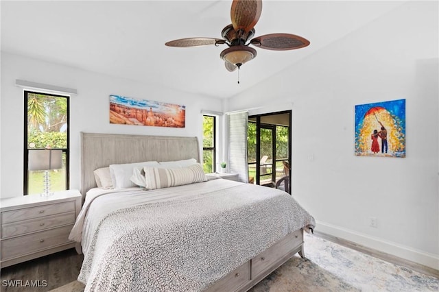10811 Breaker Ln, Naples, FL 34109 - bedroom featuring access to outside, baseboards, wood finished floors, lofted ceiling, and a ceiling fan