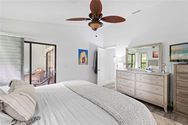 10811 Breaker Ln, Naples, FL 34109 - bedroom with light wood-style floors, lofted ceiling, ceiling fan, and access to exterior