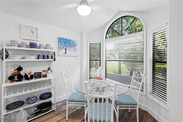 10811 Breaker Ln, Naples, FL 34109 - dining space with baseboards, wood finished floors, vaulted ceiling, and ceiling fan