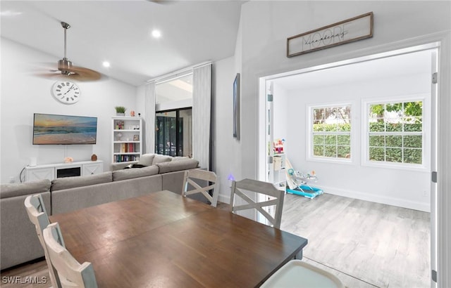 10811 Breaker Ln, Naples, FL 34109 - dining space featuring ceiling fan, wood finished floors, vaulted ceiling, baseboards, and recessed lighting