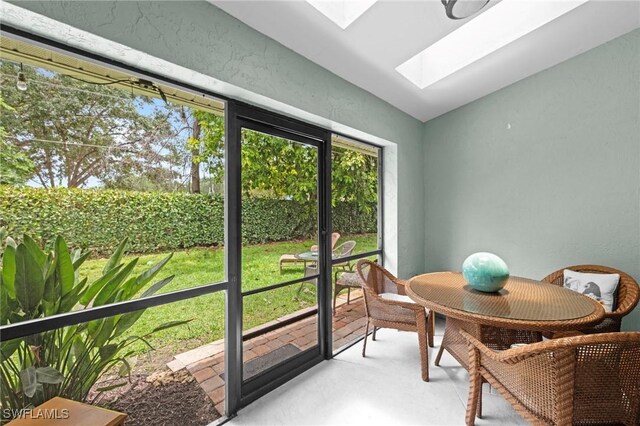 10811 Breaker Ln, Naples, FL 34109 - sunroom / solarium featuring a skylight