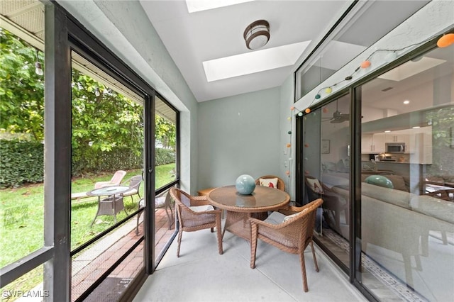 10811 Breaker Ln, Naples, FL 34109 - sunroom / solarium featuring a skylight and lofted ceiling