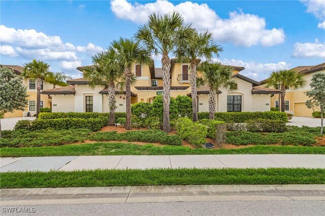 10498 Casella Way Unit 202, Fort Myers, FL 33913 - mediterranean / spanish-style home with stucco siding