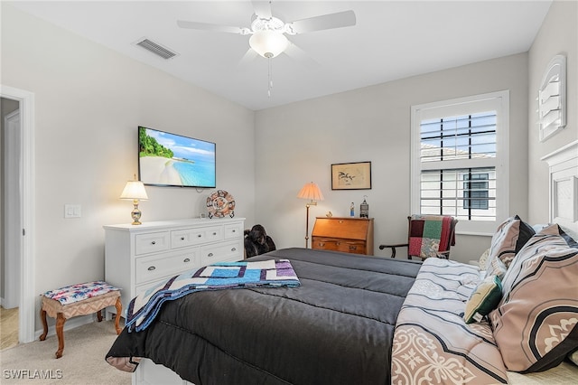 10498 Casella Way Unit 202, Fort Myers, FL 33913 - bedroom with light carpet and a ceiling fan