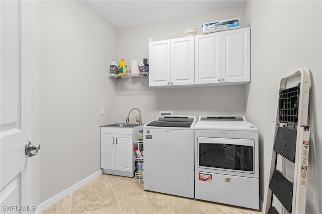 10498 Casella Way Unit 202, Fort Myers, FL 33913 - laundry area featuring washing machine and clothes dryer, cabinet space, baseboards, light tile patterned floors, and a heating unit