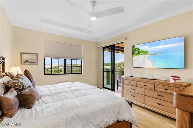 10498 Casella Way Unit 202, Fort Myers, FL 33913 - bedroom featuring access to exterior, crown molding, light wood-style floors, a raised ceiling, and ceiling fan