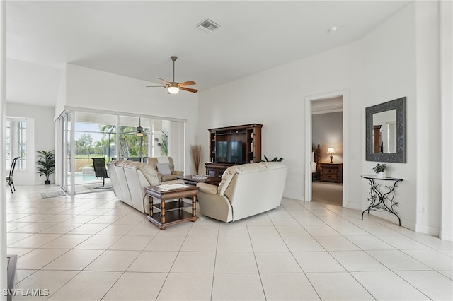 5408 SW 26th Ct, Cape Coral, FL 33914 - living area with ceiling fan and light tile patterned floors
