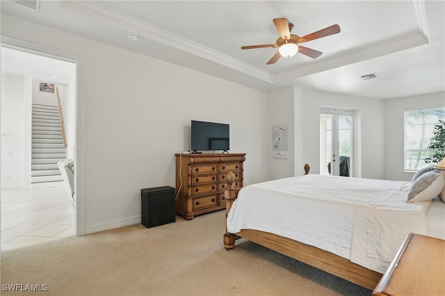5408 SW 26th Ct, Cape Coral, FL 33914 - bedroom featuring access to outside, light carpet, a raised ceiling, ornamental molding, and a ceiling fan