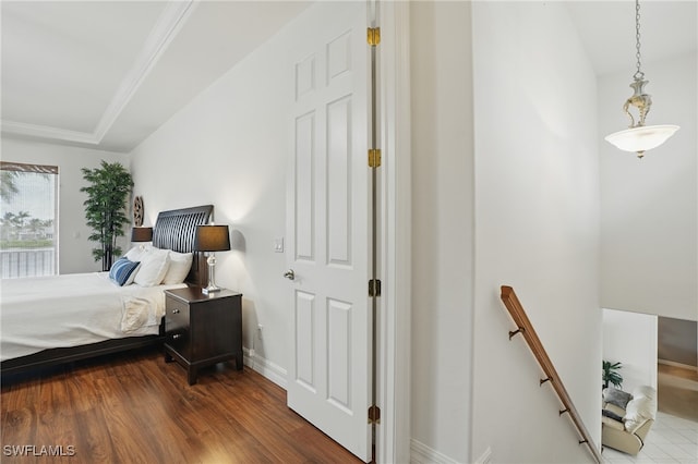 5408 SW 26th Ct, Cape Coral, FL 33914 - bedroom featuring wood finished floors and access to outside