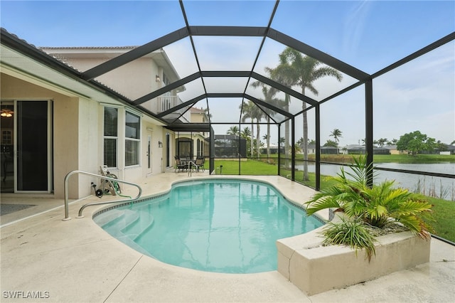 5408 SW 26th Ct, Cape Coral, FL 33914 - swimming pool with a patio area, a water view, and glass enclosure