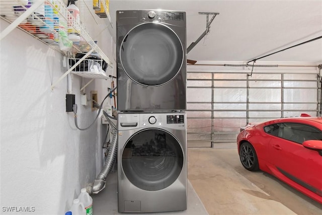 3825 Barnegat Dr, Punta Gorda, FL 33950 - laundry room featuring stacked washing machine and dryer and a garage