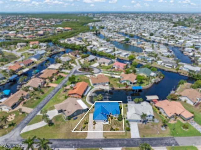 3825 Barnegat Dr, Punta Gorda, FL 33950 - aerial view of residential area with property parcel outlined and a nearby body of water