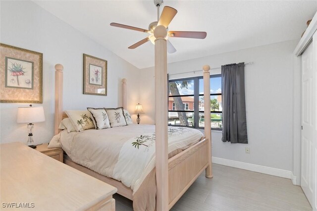 3825 Barnegat Dr, Punta Gorda, FL 33950 - bedroom featuring baseboards, a closet, vaulted ceiling, and ceiling fan
