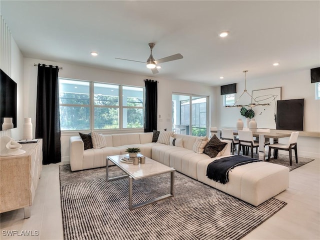 17304 Green Buttonwood Way N, Fort Myers, FL 33917 - living room with recessed lighting and ceiling fan