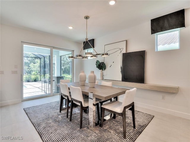 17304 Green Buttonwood Way N, Fort Myers, FL 33917 - dining room with baseboards, recessed lighting, and light tile patterned floors