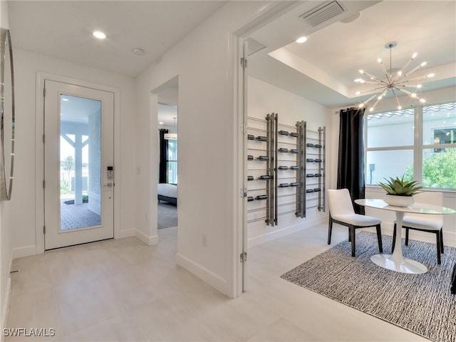 17304 Green Buttonwood Way N, Fort Myers, FL 33917 - foyer entrance featuring a chandelier, baseboards, and recessed lighting