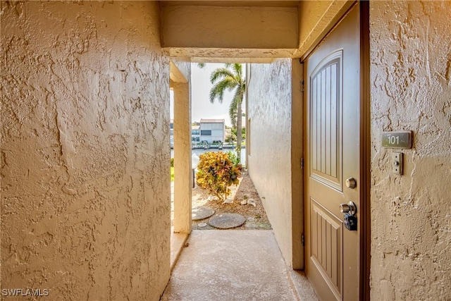 4013 SE 19th Pl Unit 101, Cape Coral, FL 33904 - view of exterior entry with stucco siding