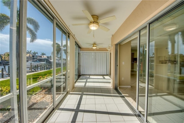 4013 SE 19th Pl Unit 101, Cape Coral, FL 33904 - unfurnished sunroom featuring ceiling fan