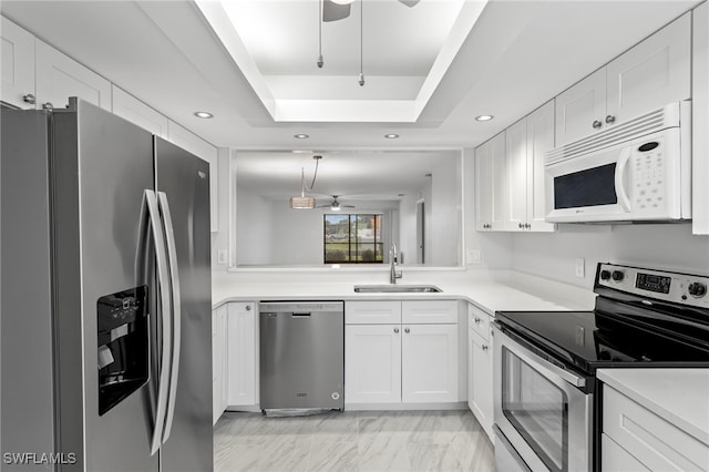 4717 Santa Barbara Blvd Unit G-2, Cape Coral, FL 33914 - kitchen featuring appliances with stainless steel finishes, a sink, a ceiling fan, white cabinets, and recessed lighting