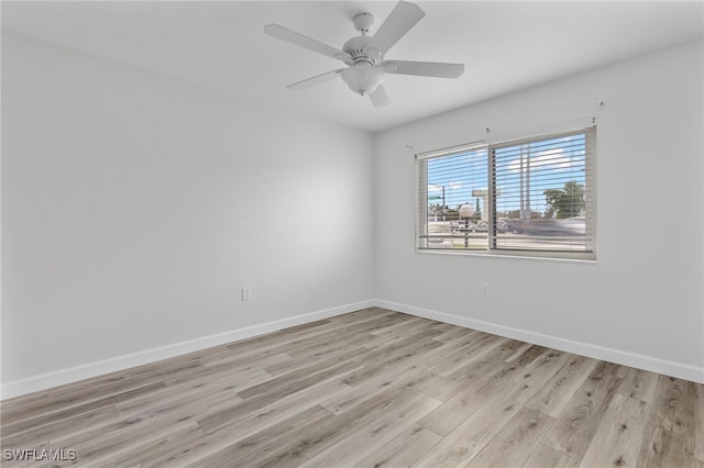 4717 Santa Barbara Blvd Unit G-2, Cape Coral, FL 33914 - unfurnished room featuring light wood-type flooring, baseboards, and a ceiling fan