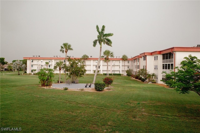 1724 Pine Valley Dr Unit 204, Fort Myers, FL 33907 - view of community with a yard