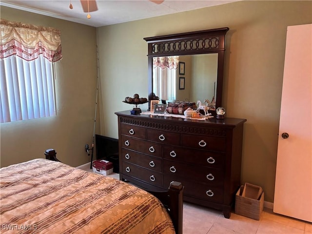 2526 SE 16th Pl Unit 105, Cape Coral, FL 33904 - bedroom featuring light tile patterned flooring and ceiling fan
