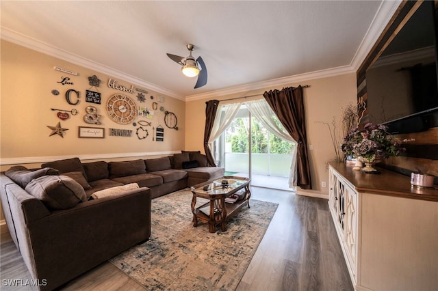 2759 Orange Grove Trl, Naples, FL 34120 - living area with ornamental molding, ceiling fan, dark wood-type flooring, and baseboards