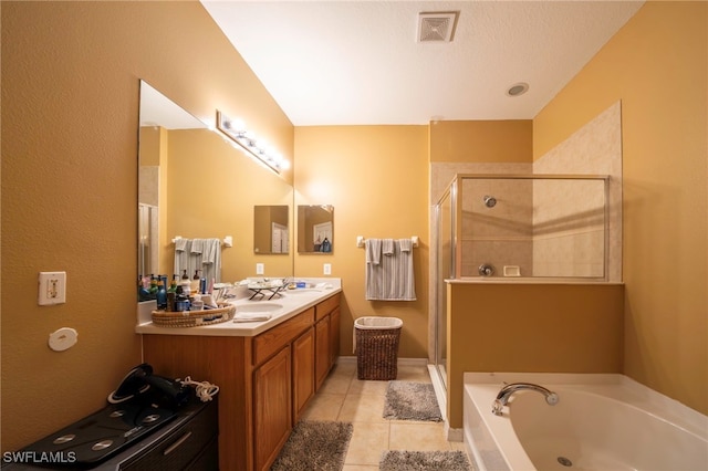 2759 Orange Grove Trl, Naples, FL 34120 - full bath with a shower stall, a bath, tile patterned floors, and double vanity