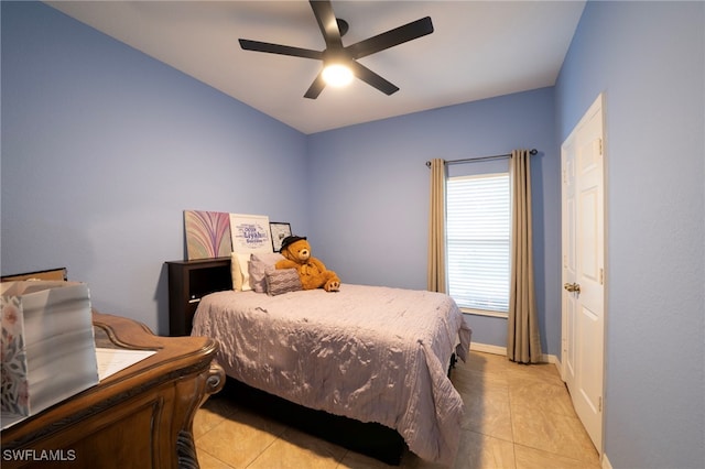 2759 Orange Grove Trl, Naples, FL 34120 - bedroom featuring light tile patterned floors, baseboards, and a ceiling fan