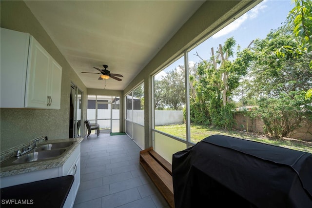 2759 Orange Grove Trl, Naples, FL 34120 - sunroom / solarium with a sink and ceiling fan
