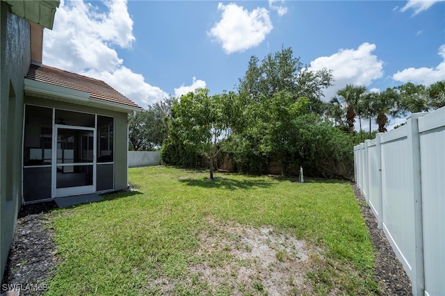 2759 Orange Grove Trl, Naples, FL 34120 - view of yard with a sunroom