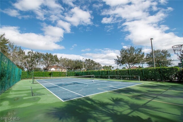 2759 Orange Grove Trl, Naples, FL 34120 - view of tennis court with community basketball court