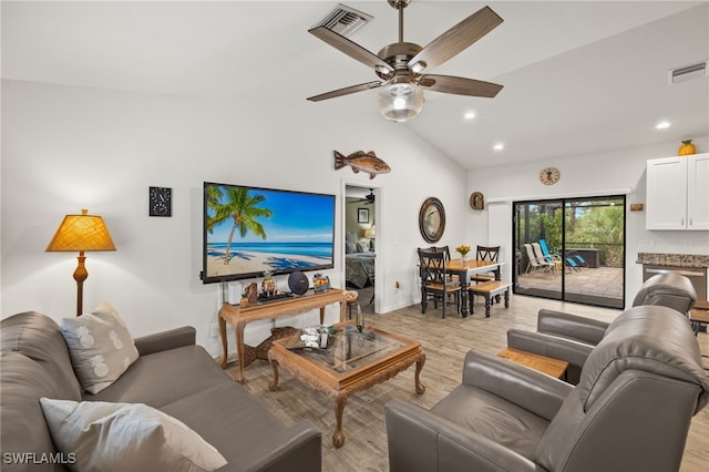 3901 NW 48th Ter, Cape Coral, FL 33993 - living room with a ceiling fan, light wood-style flooring, vaulted ceiling, recessed lighting, and baseboards