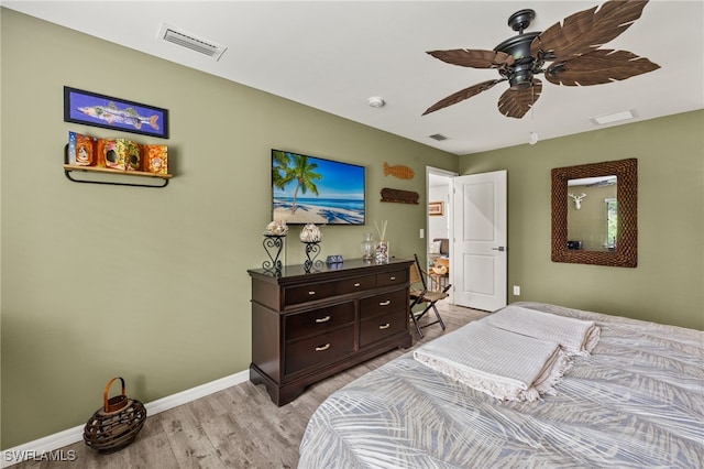 3901 NW 48th Ter, Cape Coral, FL 33993 - bedroom featuring light wood finished floors, baseboards, and a ceiling fan