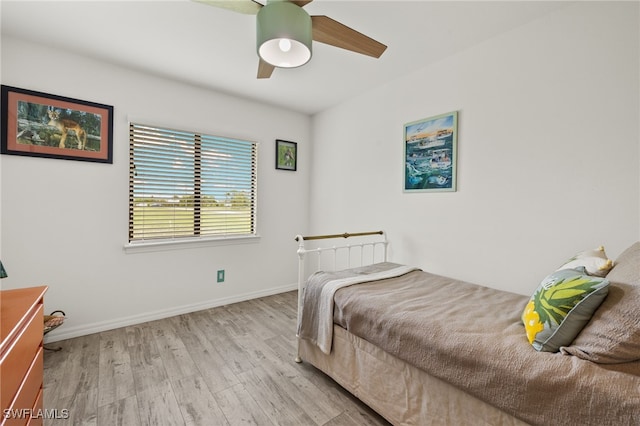 3901 NW 48th Ter, Cape Coral, FL 33993 - bedroom with wood finished floors, baseboards, and ceiling fan