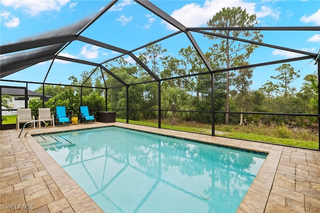 3901 NW 48th Ter, Cape Coral, FL 33993 - outdoor pool featuring a patio and a lanai
