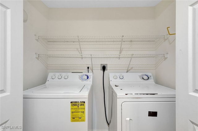 4040 Durango Ct Unit 101, Estero, FL 33928 - laundry area with washing machine and dryer