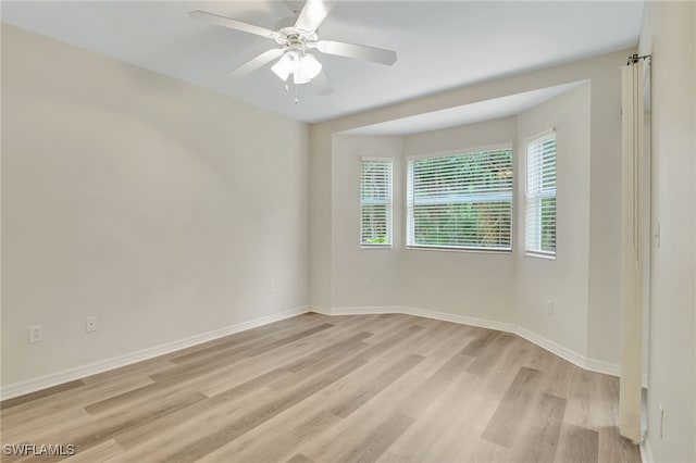 4040 Durango Ct Unit 101, Estero, FL 33928 - unfurnished room featuring light wood-type flooring, ceiling fan, and baseboards