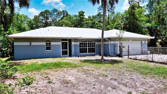 2780 39th St SW, Naples, FL 34117 - ranch-style home featuring an attached garage and stucco siding