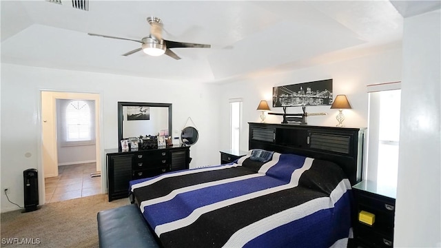 2780 39th St SW, Naples, FL 34117 - tiled bedroom with carpet floors and a ceiling fan