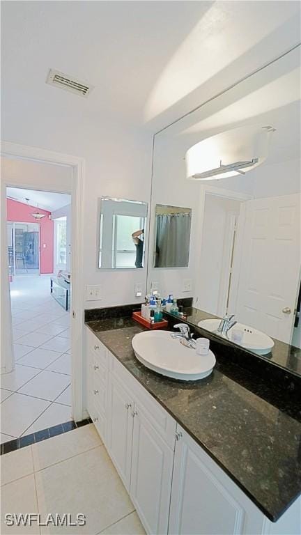 2780 39th St SW, Naples, FL 34117 - bathroom featuring tile patterned flooring and vanity