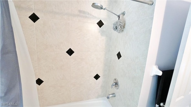2780 39th St SW, Naples, FL 34117 - bathroom featuring shower / bathtub combination with curtain