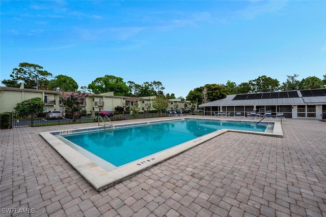 7400 College Pkwy Unit 61B, Fort Myers, FL 33907 - community pool featuring a patio