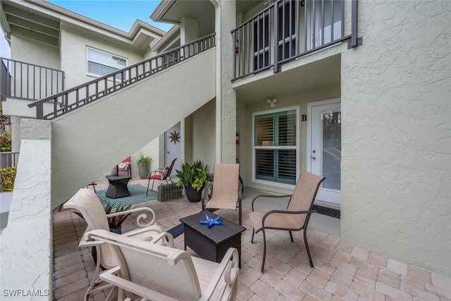 7400 College Pkwy Unit 61B, Fort Myers, FL 33907 - view of patio / terrace featuring a balcony
