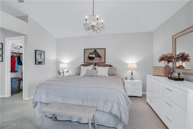 28076 Cavendish Ct Unit 2107, Bonita Springs, FL 34135 - bedroom with light carpet, a chandelier, baseboards, a walk in closet, and vaulted ceiling
